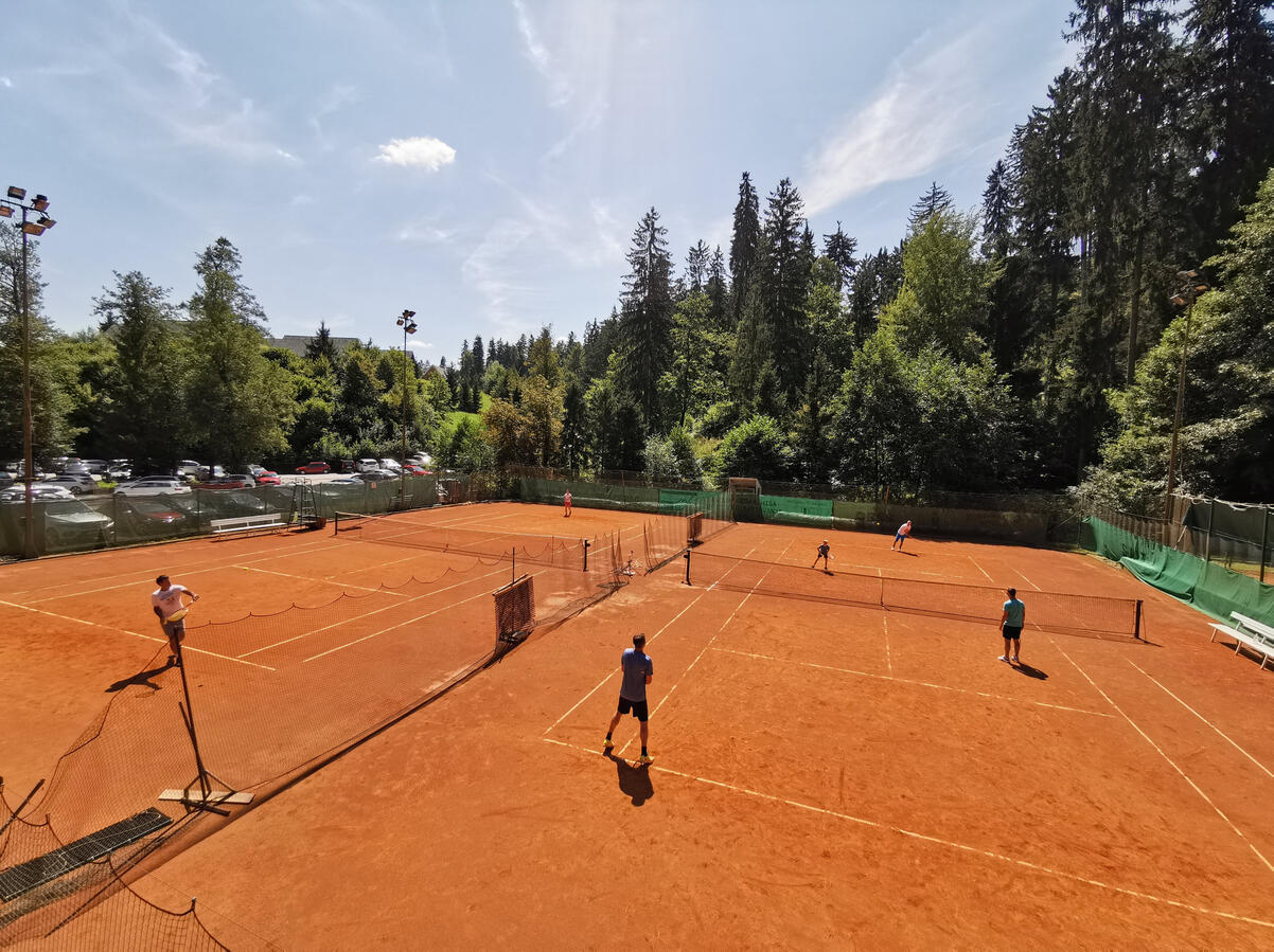 Free parking next to tennis courts